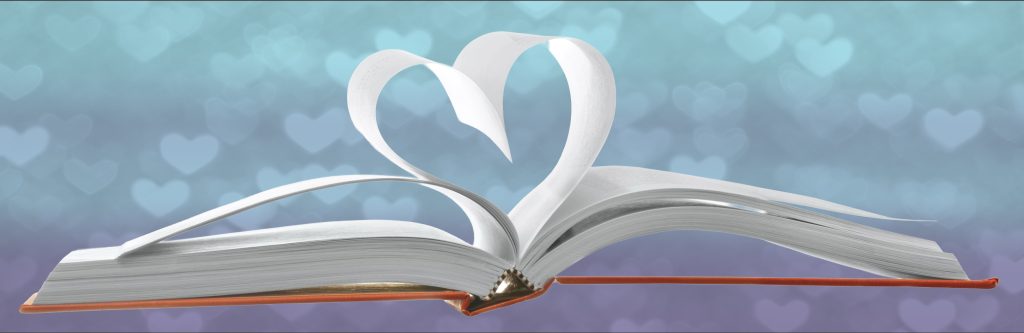n open book with its pages curved into the shape of a heart. The background is a gradient of soft blue and purple tones with glowing heart shapes, symbolizing romance and the Diamond Heart award.